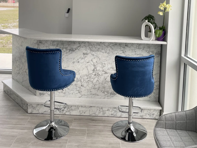 Salon counter with blue accent chairs