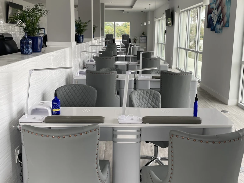 Manicure stations beside the windows
